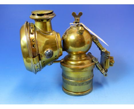 A VETERAN BRASS MOTORCYCLE LAMP.