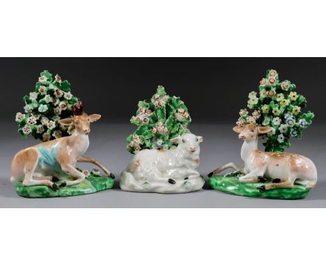 A Pair of Derby Porcelain Figures of a Stag and Doe, Late 18th Century, with bocage, patch marks and incised 2, each 4.5ins h