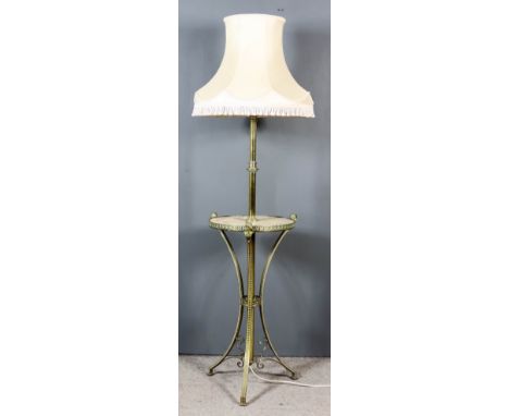 A Brass and Onyx Standard Lamp, Late 19th Century, with turned central column, on three splayed supports, 58ins high