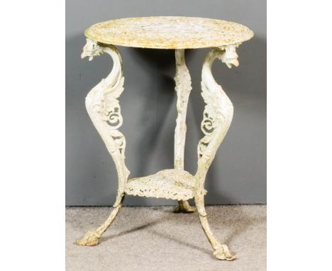 A White Painted Cast Iron Circular Garden Table, 19th Century, with pierced top on three shaped griffin pattern supports and 