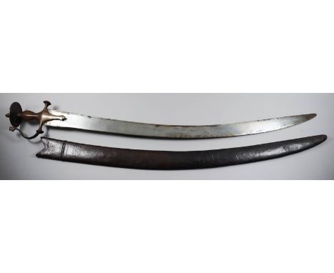 A 19th Century Indian Talwar, the 31ins steel blade with steel hilt, bellied grip, short quillons and circular pommel with br