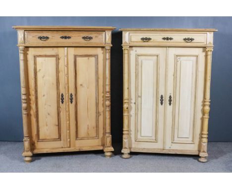 Two 19th Century Eastern European Stripped Pine Side Cabinets, each fitted one drawer and cupboards under enclosed by a pair 