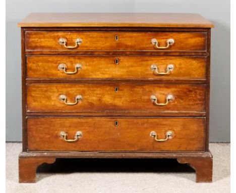 A George III Mahogany Chest, with moulded edge to top, fitted four long graduated drawers, on bracket feet, 39.5ins wide x 19