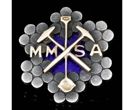 A 14ct Gold Lapel Badge, by Tiffany &amp; Co for the Mining and Metallurgical Society of America, in the form of six flowerhe