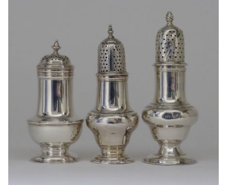 Three George III Silver Muffineers, one with slightly domed cover, by F. R., London 1750, with moulded rim and girdle and cir