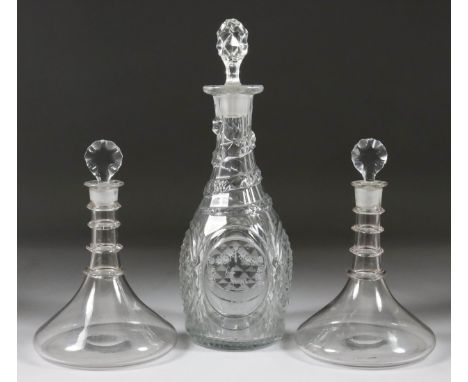 An English Glass Mallet Shaped Decanter and Stopper with Diamond Cutting, 19th Century, one panel with crest of centaur and a