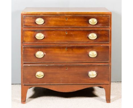 A Late Georgian Mahogany and Pine Sided Chest, the square edge to top inlaid with stringings, fitted four long graduated draw