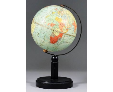 A Philips 6ins diameterTerrestrial Globe, Early 20th Century, printed in colours with plain turned ebonised stand, 10ins high