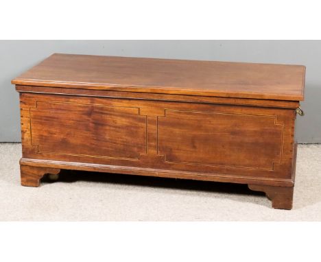 A Mahogany Rectangular Two-Handled Coffer, with moulded edge to top and inlaid with stringings, on bracket feet, 44ins wide x