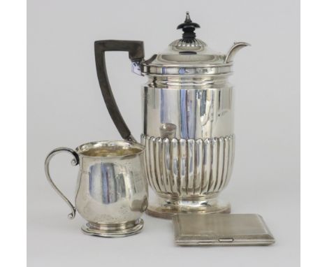 An Edward VII Silver Hot Water Jug, by the Goldsmiths &amp; Silversmiths Co. Ltd, London 1902, with cylindrical partly reeded