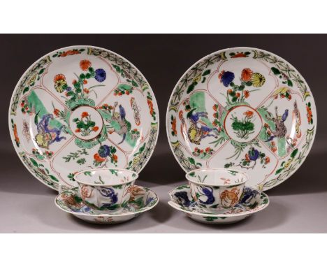 A Pair of Chinese "Famille Verte" Porcelain Saucer Shaped Dishes, 18th Century, painted in the Famille Verte palette with myt