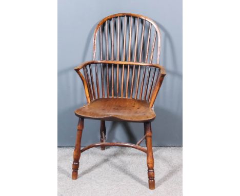 A 19th Century Yewwood and Elm Seated Stickback Windsor Armchair, with two-tier stick back, dished seat on turned underframe 