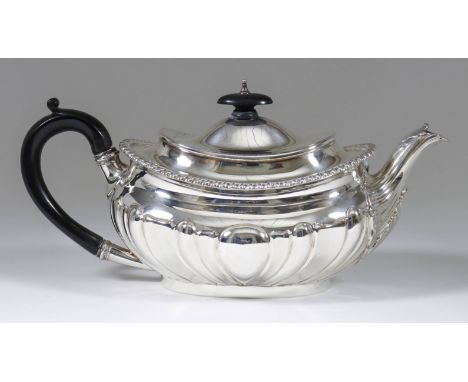 A Late Victorian Silver Oval Tea Pot, maker's mark indistinct, London 1900, with partly lobed body and gadroon mounts to rim,