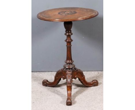 A Victorian Walnut Circular Tripod Table, the top with circular panel to centre inlaid with floral marquetry, on turned cenra