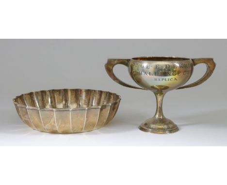 A George V Silver Circular Bowl and a Silver Two-Handled Prize Cup, both "Paul E. Derrick Challenge Cup (Replica) Regent Adve