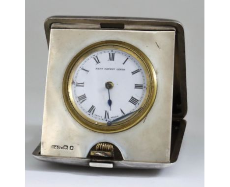 A George V Silver Cased Travelling Timepiece, by Cohen &amp; Charles, London 1919, the 1.625ins diameter white enamel dial wi