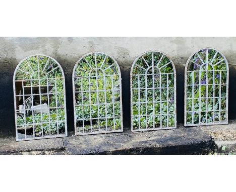 ARCHITECTURAL GARDEN MIRRORS, a set of four, 60cm H x 36cm W, Georgian style, with overlaid glazing bars, aged frames. (4) 