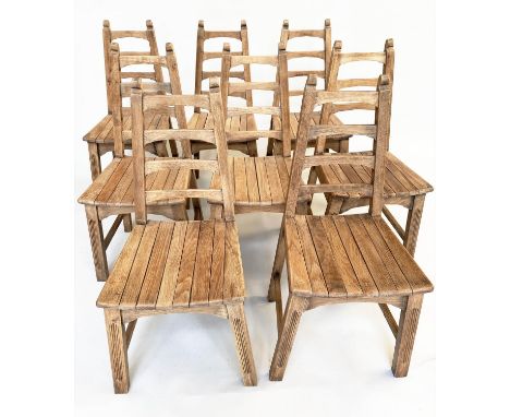 DINING CHAIRS, a set of eight, Arts and Crafts style oak each with tapering ladder back and slatted seats. (8) 