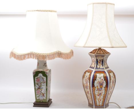 A pair of vintage 20th century Chinese ceramic table lamps, each having transfer printed vignettes featuring birds to body. M