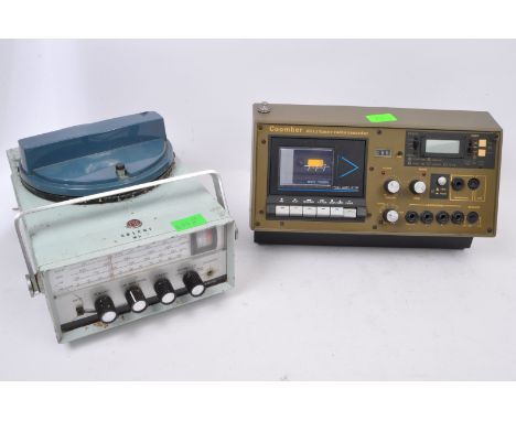 Two retro vintage 20th century radiophonic equipment. The lot to include a Coomber 3011 Timer Radio Cassette Recorder player,