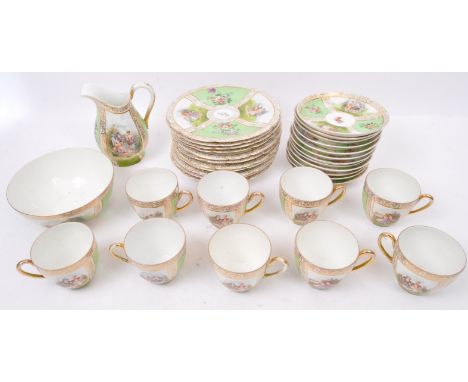 Mid 20th Century circa 1970s china tea service set. Decorated in floral gilt with a couple regency period attire with a white