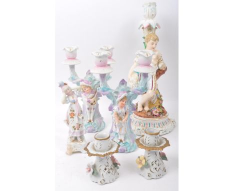 A collection of vintage 20th Century Sitzendorf style porcelain china figurines and candle candelabra stick holders. Comprisi