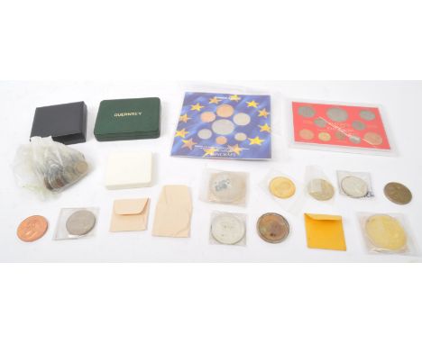 A collection of vintage 20th century commemorative UK coins &amp; coins sets. The lot to include a Guernsey 1966 four coins s