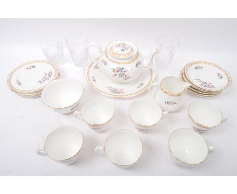 A vintage 20th century circa 1960s Royal Grafton fine bone china tea service. The lot to include a teapot, cups &amp; saucers