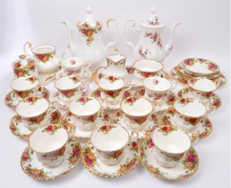An assortment of vintage 20th century Royal Albert fine bone china coffee services. The tea services comprising of 'Old Count