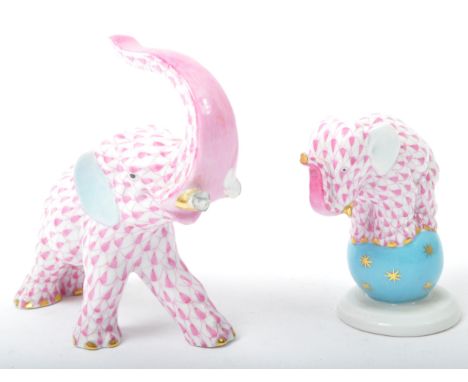 Herend - Two 20th century Hungarian Herend porcelain elephants figurines depicted balancing on ball and another mid stride wi