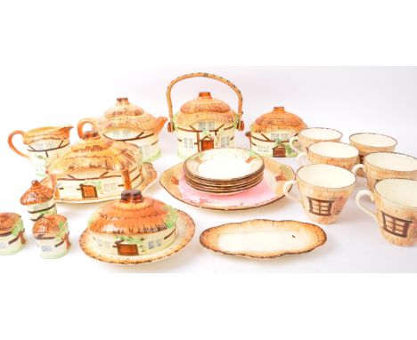 A vintage 20th century&nbsp;Burlington Ware 'Devon Cobb' tea service comprising of teapot, ginger jar, various butter dishes,