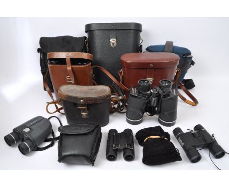 A large collection of vintage late 20th century &amp; later binoculars. The lot to include a USSR 8x30 binocular, a Carl Zeis