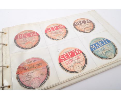 Motorabilia Interest - A collection of approximately sixty-five vintage tax discs ranging from the 1930s to the 2000's. Measu