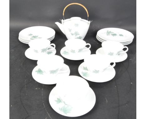 A vintage 20th century bone china Noritake 'Wild Ivy' tea service. the set comprising of tea pot, six cups &amp; saucers with