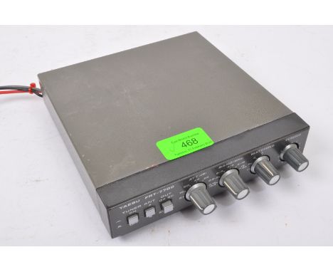 A retro vintage 20th century Yaesu FRT-7700 tuner antenna.
