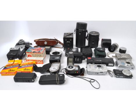 A large collection of vintage 20th century cameras and photographic equipment to include a Nettar folding camera, Braun flash