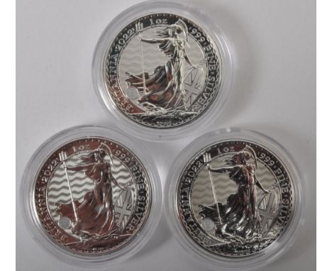 Three UNITED KINGDOM Queen Elizabeth II (1952-2022) 1Oz 999 fine silver Britannia £2 two pound coins. Each coin having a stan