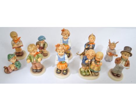 Hummel Goebel - A collection of NOS New Old Stock boxed German Hummel Goebel figurines to include We Congrats, Spring Sweethe