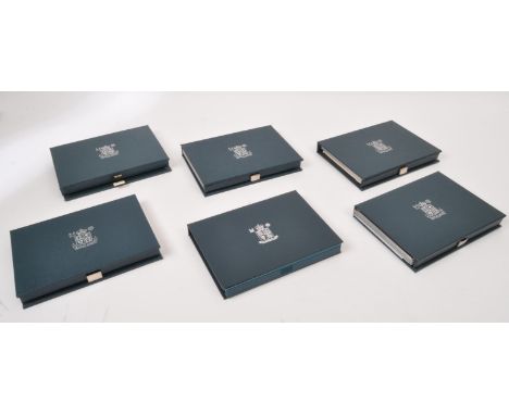 An assortment of vintage 20th century United Kingdom Proof Coin Collections to include 1984, 1985, 1986, 1987, 1990, &amp; 19