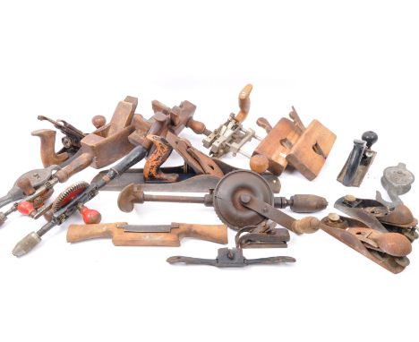 A collection of early 20th century wood working tools to include a Rolson smoothing plane, a plow plane, a craftsman jointer 