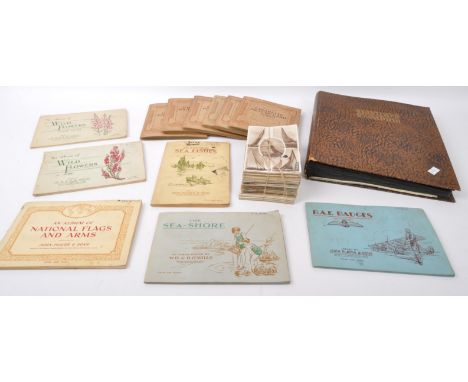 A collection of vintage early 20th Century cigarette cards and postcards. Including; a collection of boat ship yacht postcard