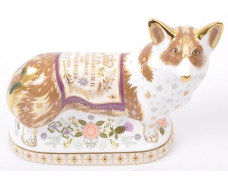 Royal Crown Derby - A NOS New Old Stock fine bone china corgi figure. Commemorating the Celebration of Platinum Jubilee of H.