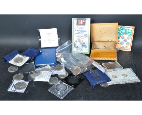 A collection of foreign and UK currency. Including coins which are half and full silver. Some commemorative coins with Queen 