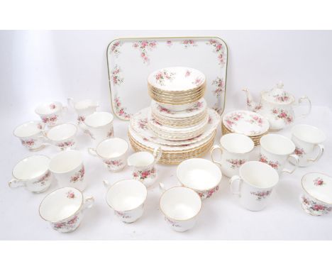 A vintage 20th century Royal Albert 'Lavender Rose' bone china tea service. The set to include a tea pot, an oval serving pal