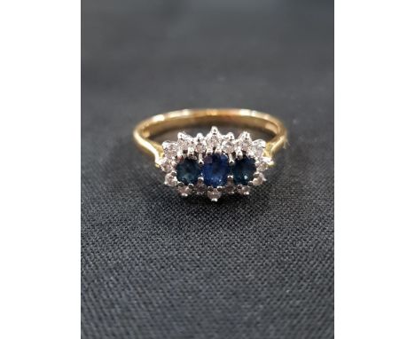 18 CARAT SAPPHIRE AND DIAMOND RING 