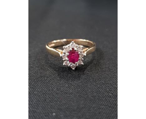 9 CARAT RUBY AND DIAMOND RING 