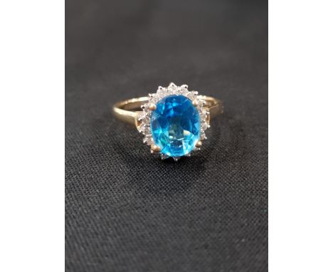 9 CARAT BLUE TOPAZ AND DIAMOND RING 