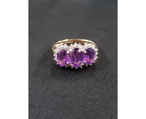 9 CARAT AMETHYST AND DIAMOND RING 