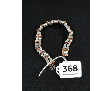 14K GOLD PEARL AND GARNET BRACELET 