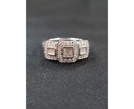 9 CARAT WHITE GOLD AND DIAMOND RING WITH HALF CARAT OF DIAMONDS 